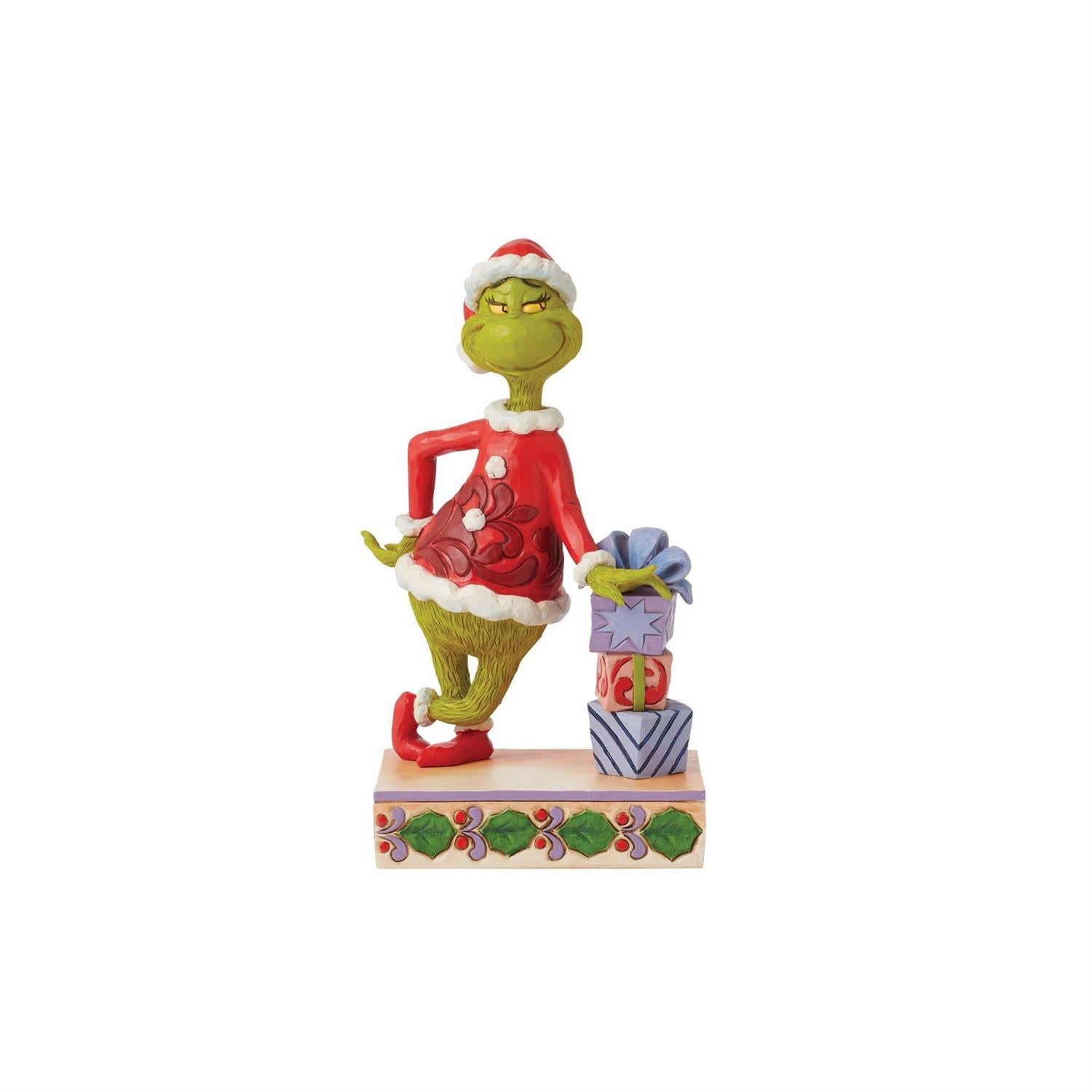 Grinch Leaning on Gifts