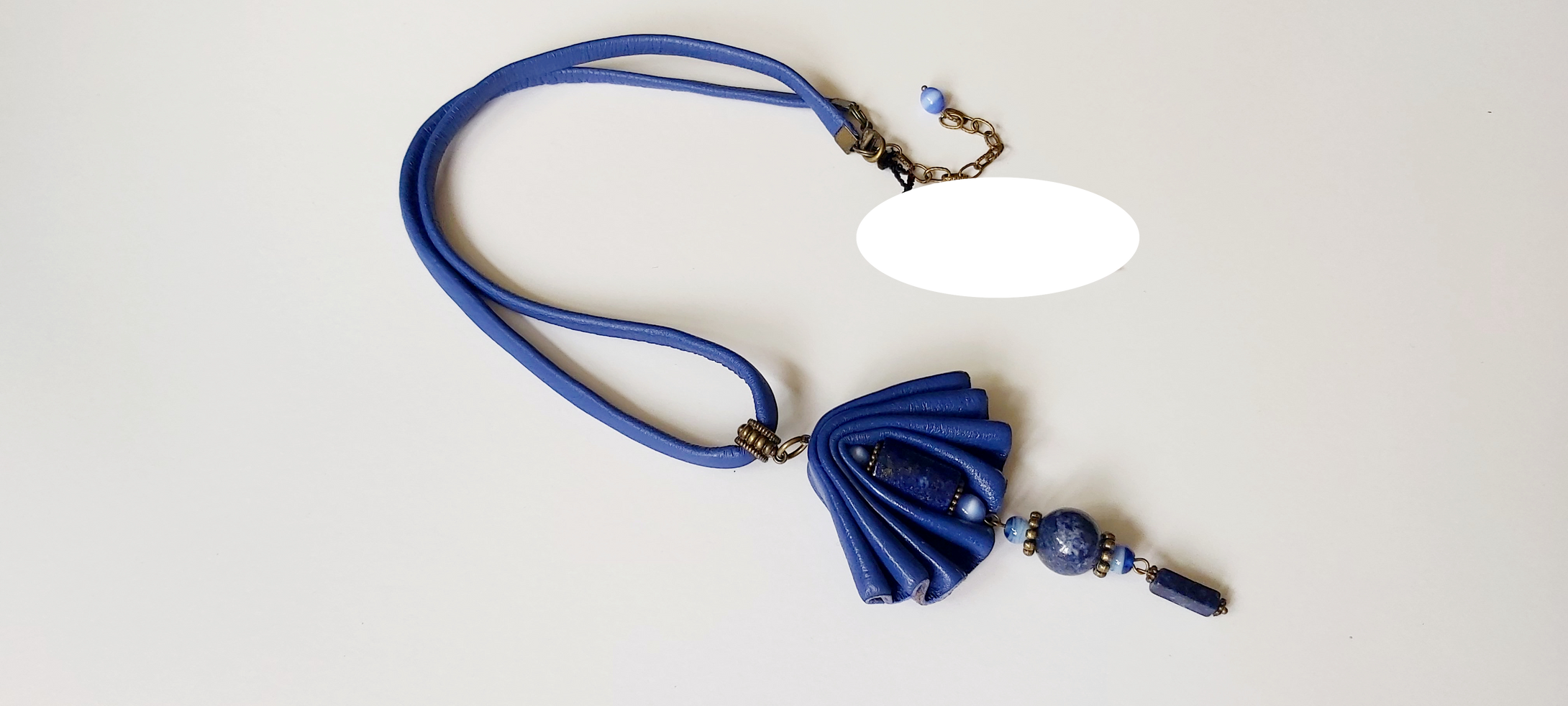 Handmade Leather Necklace with Blue Flowers