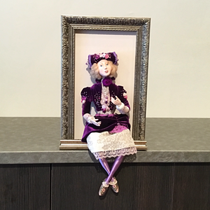 Framed Doll with Purple Dress